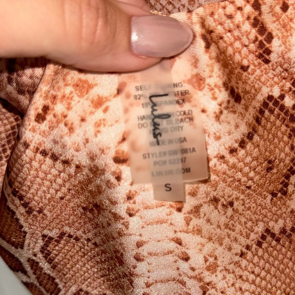 Wild Desires Tan Snake Print Long Sleeve One-Piece Swimsuit
Lulus - Picture 6 of 7